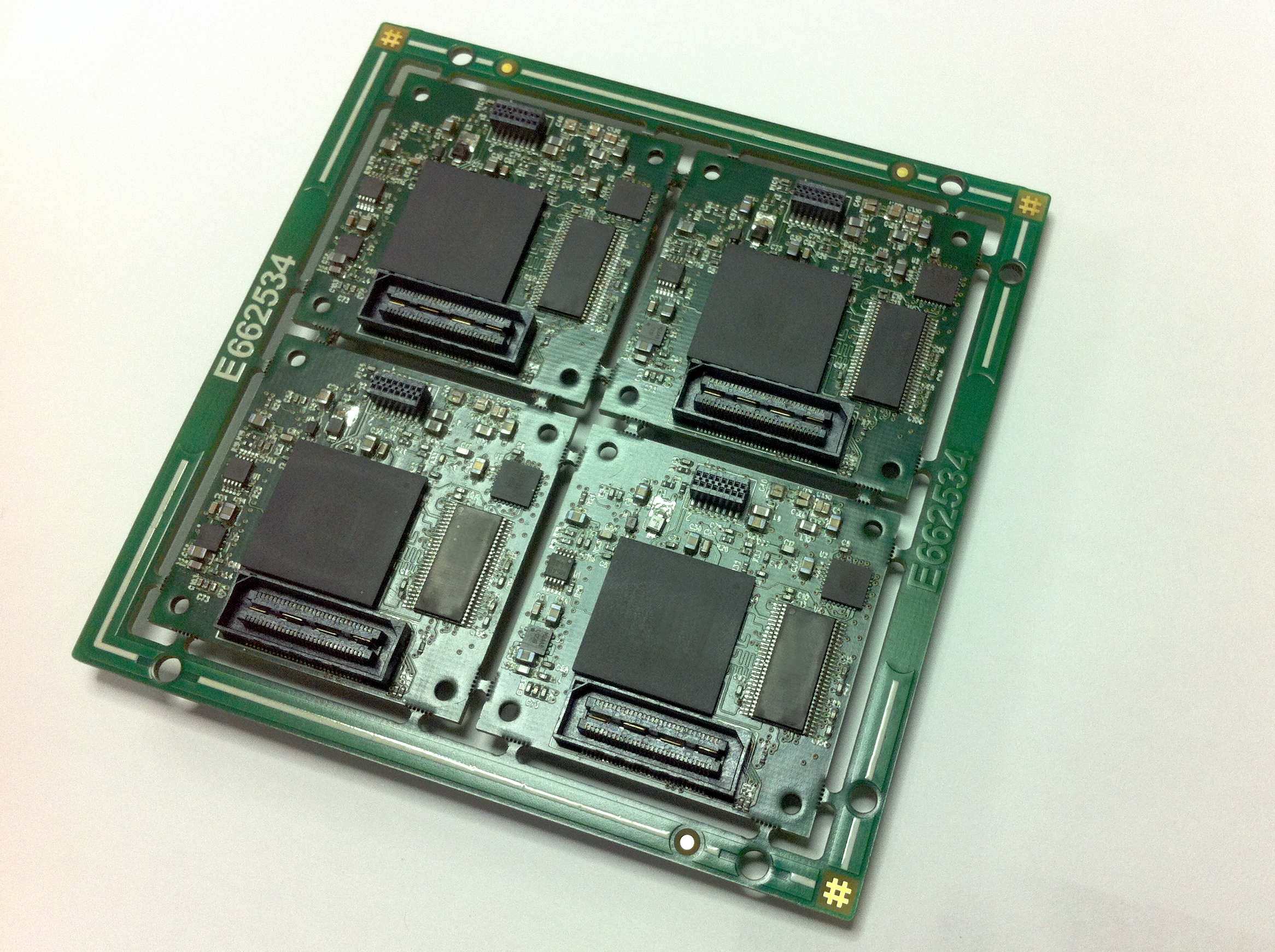 Panel of four CPLD PCBs