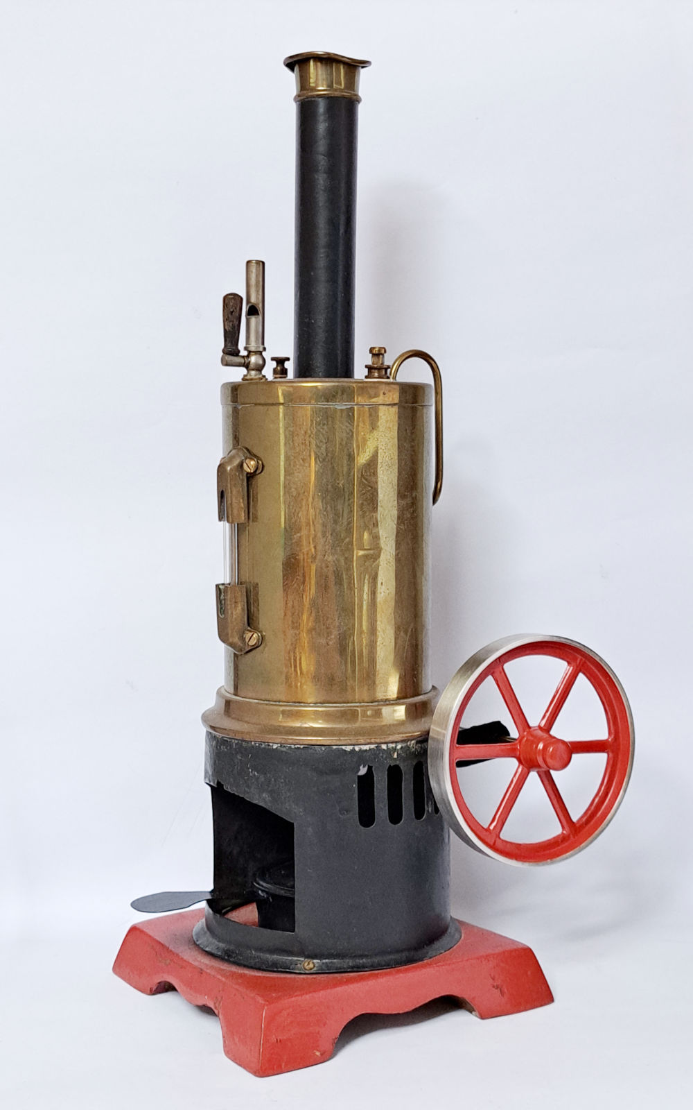 Upright toy steam engine from around the year 1900